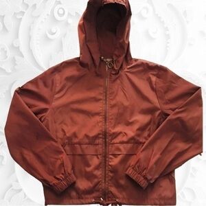 NWOT Elodie Long Sleeve Hooded Windbreaker With Front Pockets in Copper